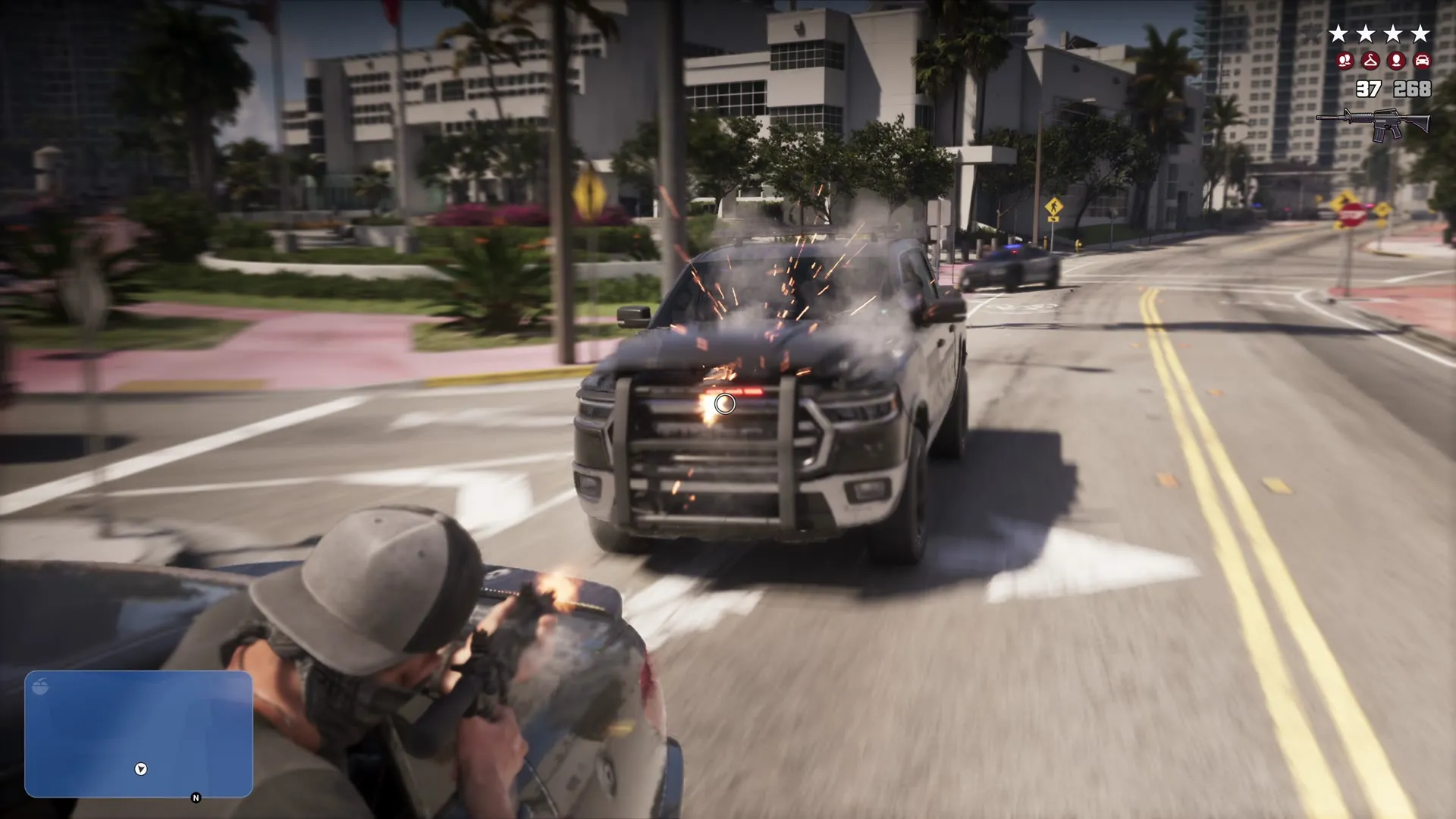 Jason firing a rifle from the back of a car at a police pickup during the highway chase in GTA 6 An Extended Look, with the six-slot wanted level showing four stars in the top-right corner. Still from Rockstar Games' official video.