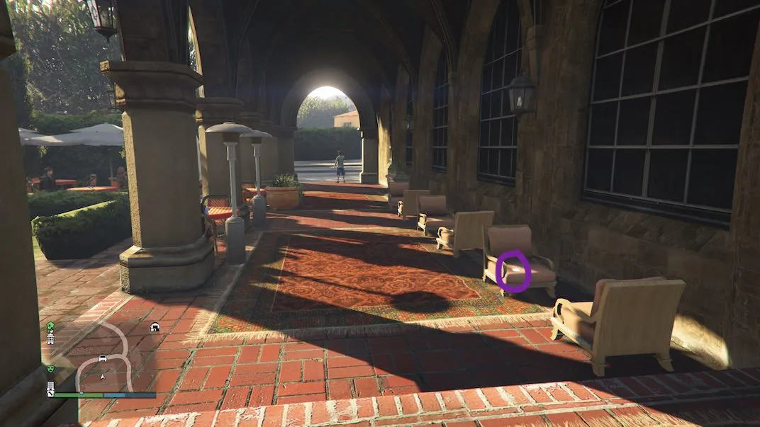 The 9th of 54 playing card locations in Grand Theft Auto V Online is located outside a hotel on the seat of a chair.