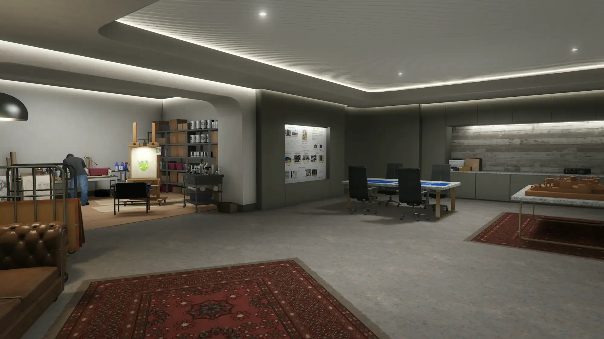 Wide view of the Art Studio interior on Basement Level 2 of a GTA Online Mansion, with a counterfeiter painting a replica at an easel, the heist planning board on the wall, a meeting table covered in blueprints, and a scale model of the Kortz Center