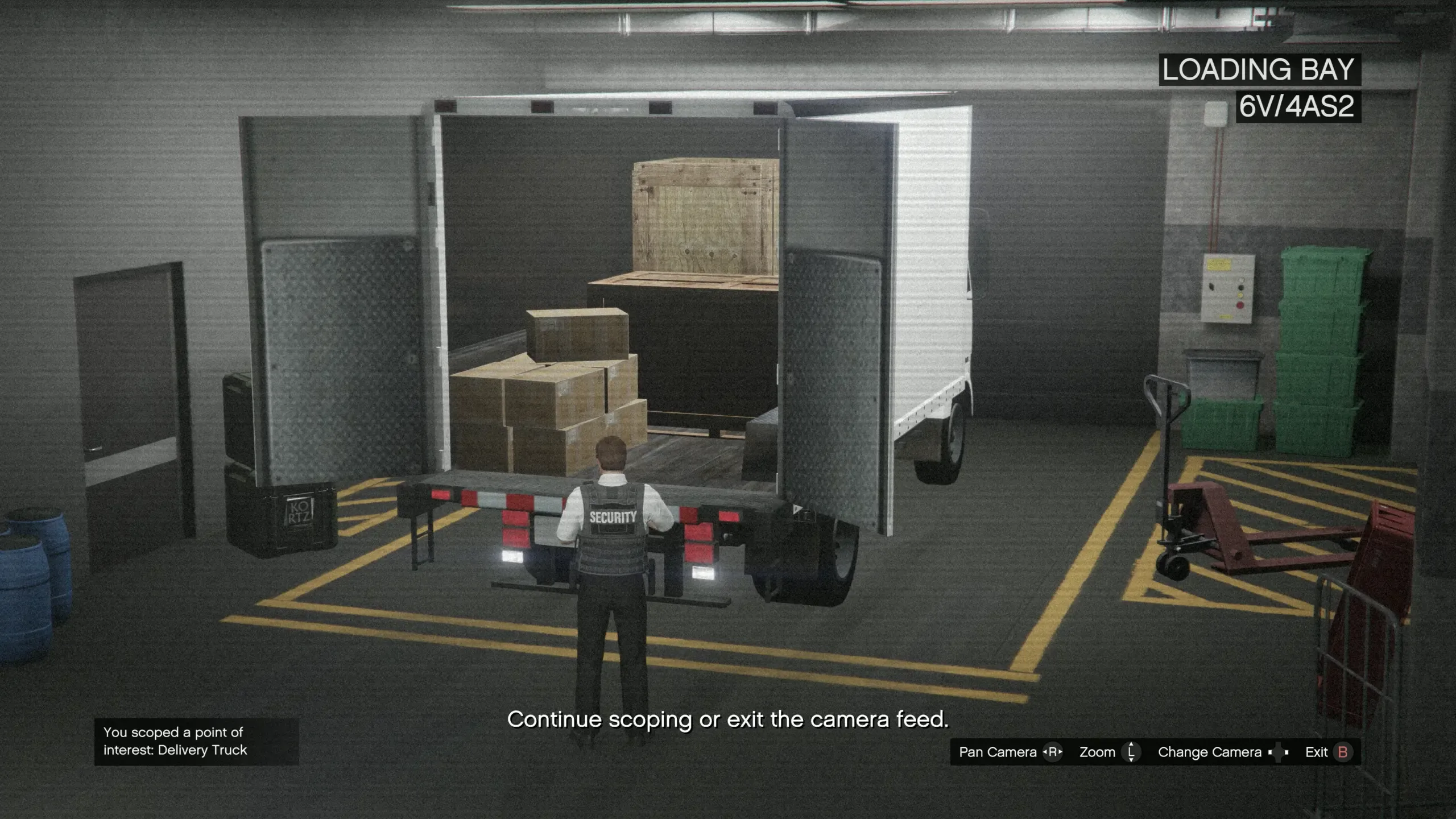 The Loading Bay CCTV feed showing a delivery truck loaded with guard equipment crates at the Kortz Center